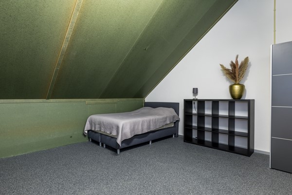 Foto - Te koop: In Landgraaf op een zeer kindvriendelijke locatie bevindt zich deze nette en moderne instapklare energiezuinige tussenwoning uit 2008